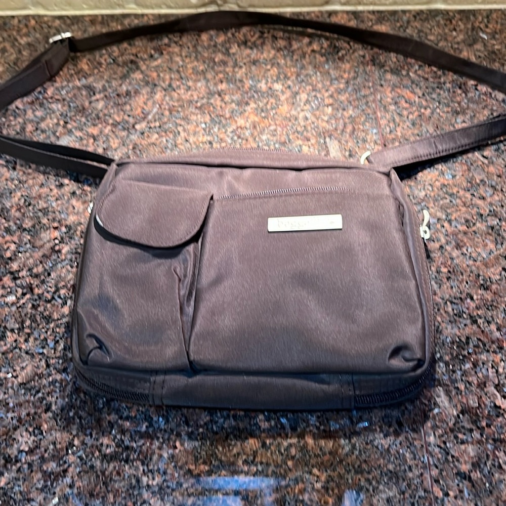 Gently used, brown, cross body Baggallini purse with adjustable strap
